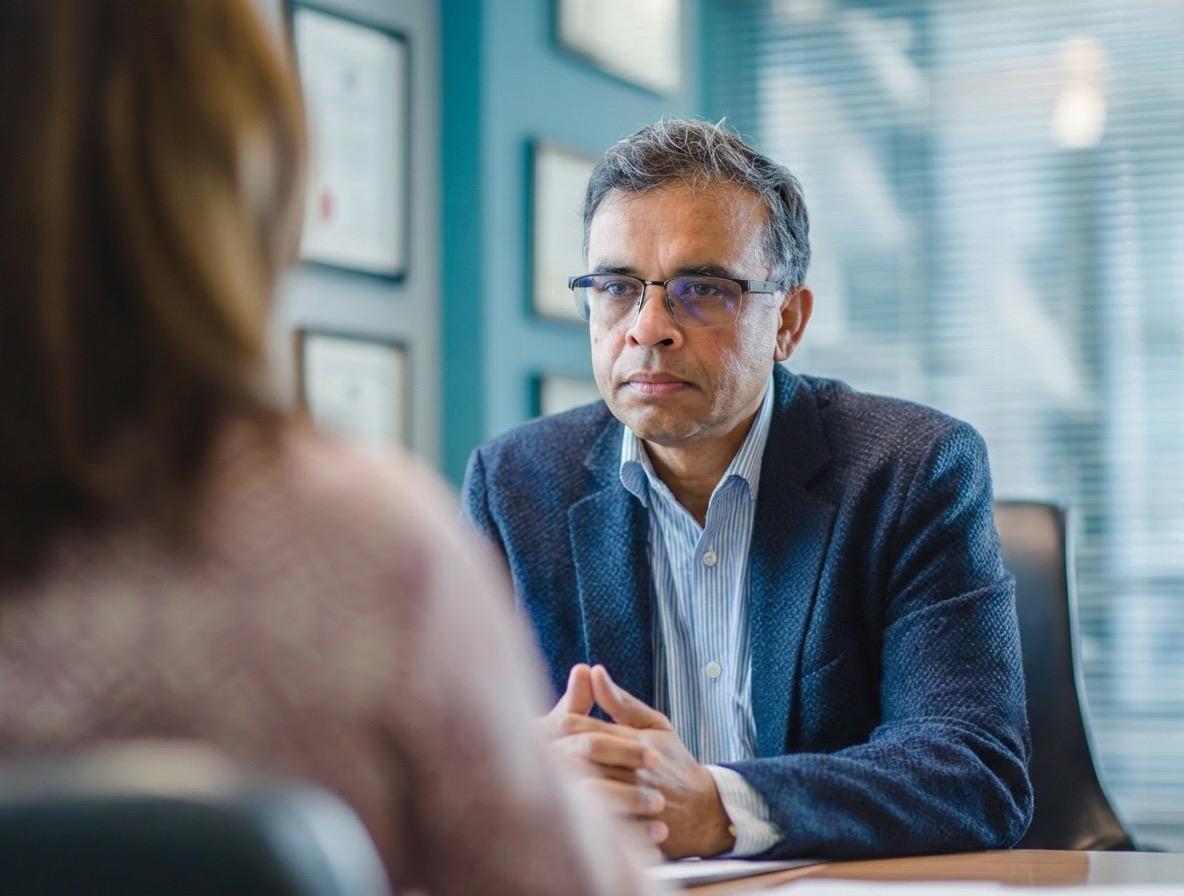 Mr Sumit Kar listening attentively to patient